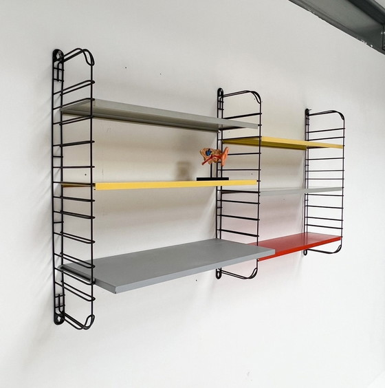 Image 1 of Nine-Piece Yellow/Red Tomado Wall Rack From A. Dekker, 1950'S