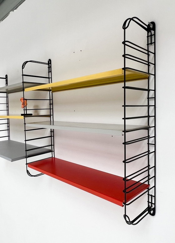 Image 1 of Nine-Piece Yellow/Red Tomado Wall Rack From A. Dekker, 1950'S