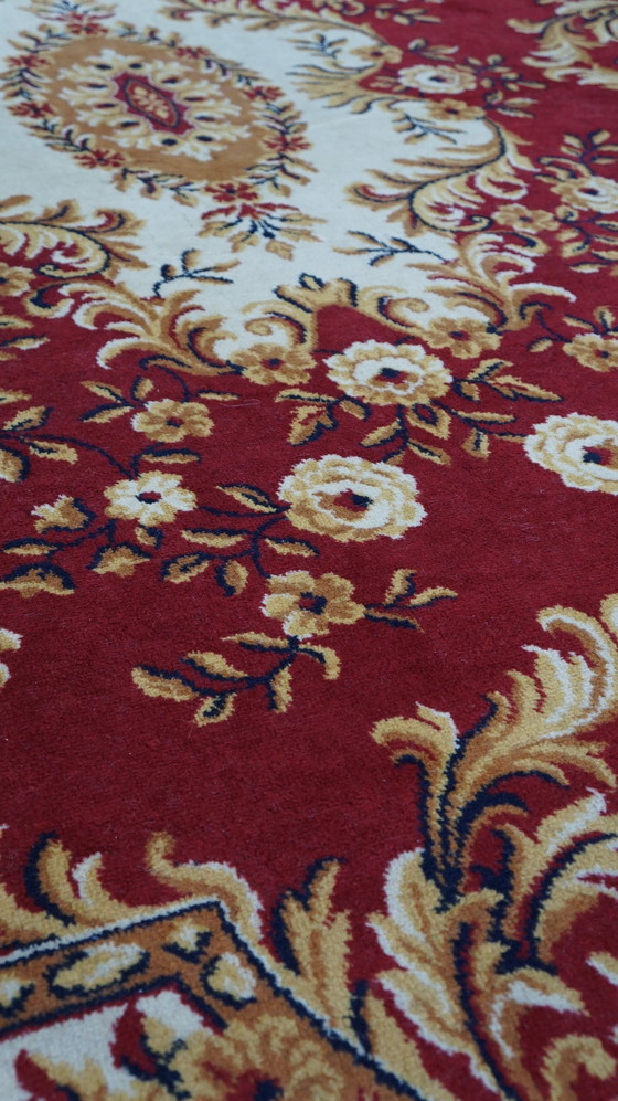 Image 1 of Red Oriental wool rug with yellow flowers, 285 x 200 cm