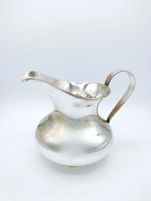 Silver water or wine jug