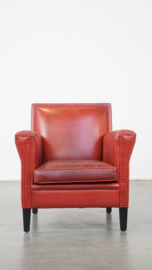 Red Armchair Made Of Sheepskin