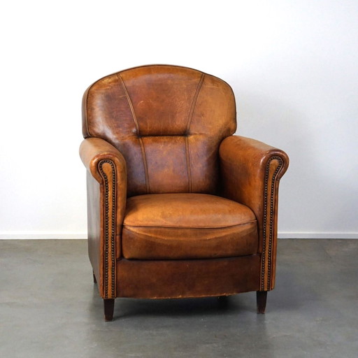 Sheep leather armchair, large model with higher back