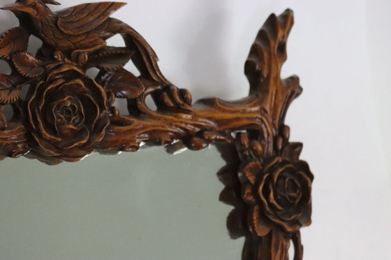 Image 1 of Miroir chinois en forme de fleurs et de branches sculptées