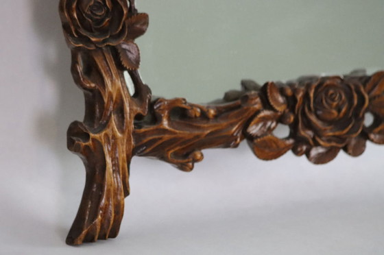 Image 1 of Chinese mirror shaped with carved flowers and branches