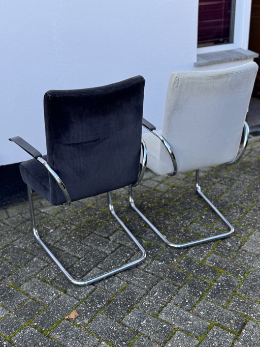 Pair Of Tubular Steel Arm Chairs
