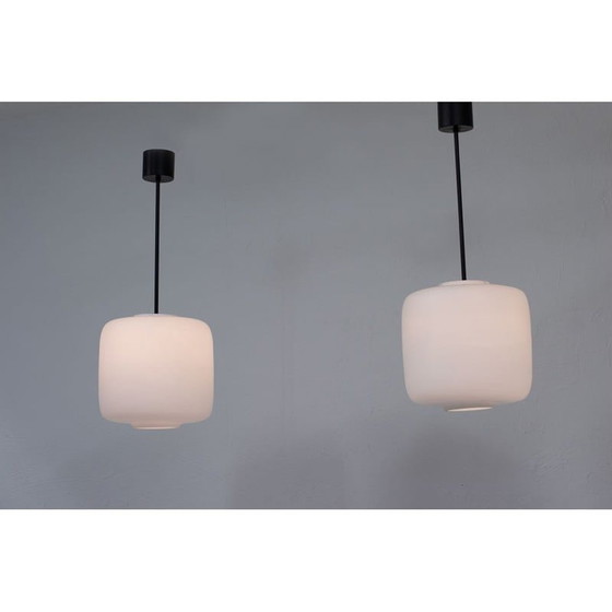 Image 1 of Pair of vintage Swedish black metal and white matte opaline glass pendant lamps, 1950s