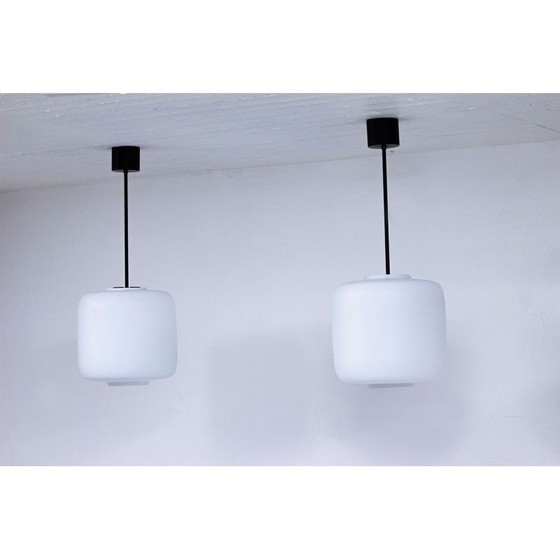 Image 1 of Pair of vintage Swedish black metal and white matte opaline glass pendant lamps, 1950s