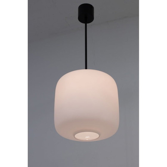 Image 1 of Pair of vintage Swedish black metal and white matte opaline glass pendant lamps, 1950s