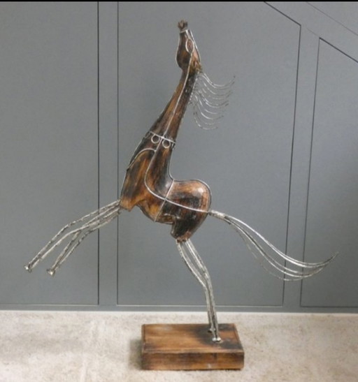 Sculpture cheval montant en teck