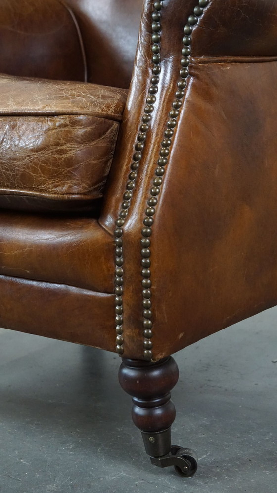 Image 1 of Beef Leather Armchair With Front Legs On Wheels