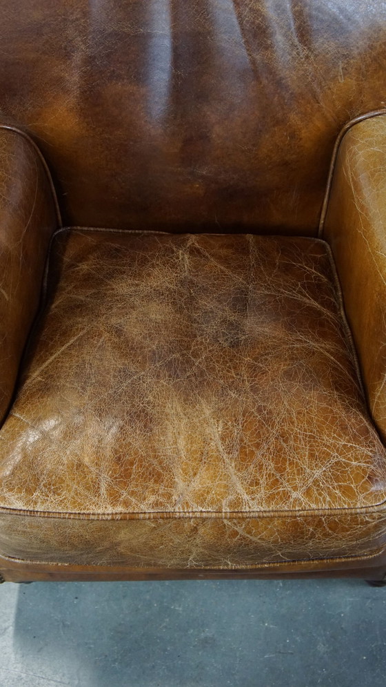 Image 1 of Beef Leather Armchair With Front Legs On Wheels