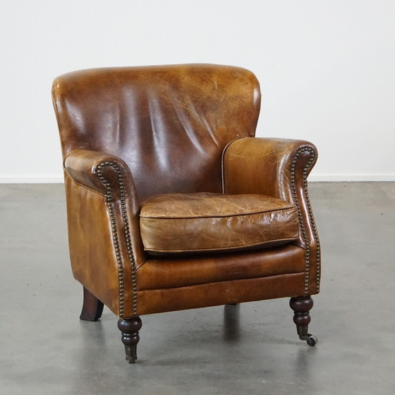 Image 1 of Beef Leather Armchair With Front Legs On Wheels