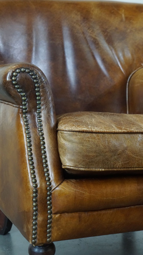 Image 1 of Beef Leather Armchair With Front Legs On Wheels