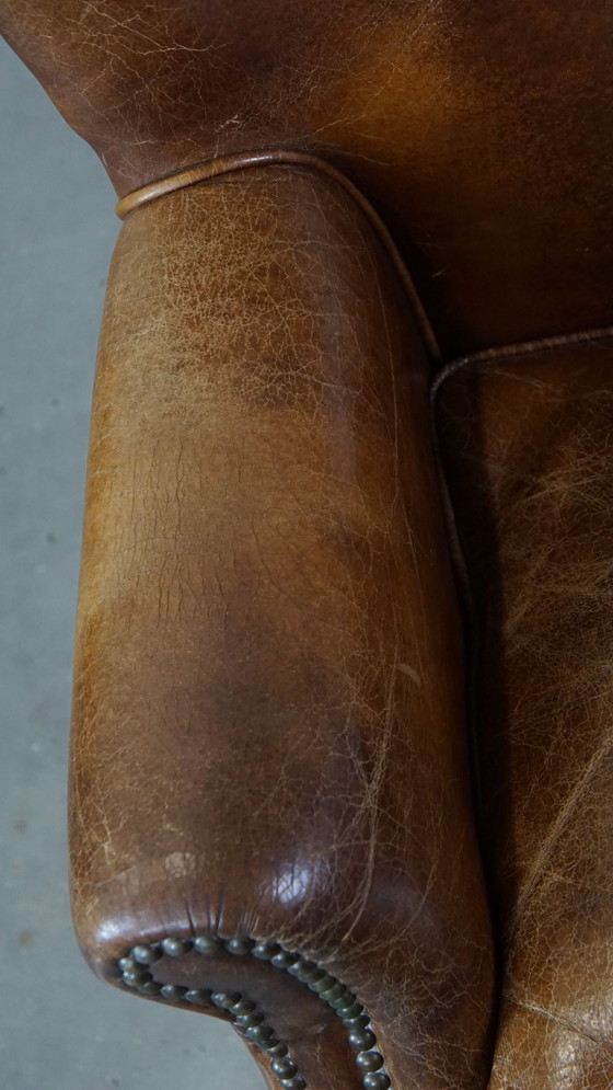 Image 1 of Beef Leather Armchair With Front Legs On Wheels