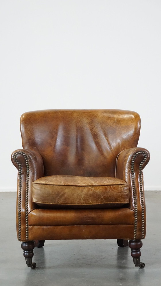 Image 1 of Beef Leather Armchair With Front Legs On Wheels