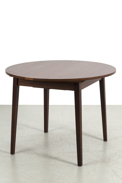 Round sixties pull-out table