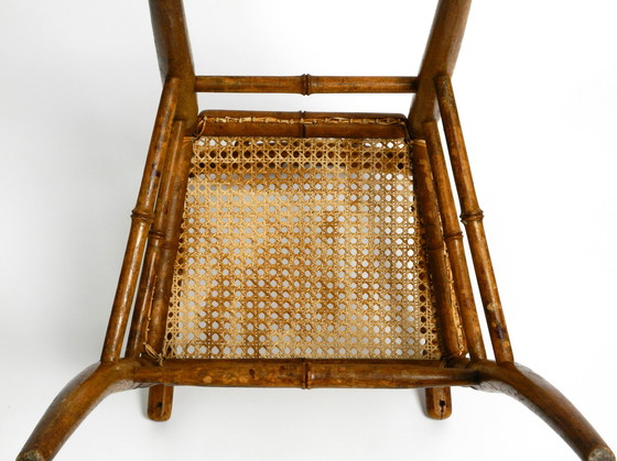 Image 1 of French highchair for a child from the 1930s made of bentwood with Viennese wicker seat