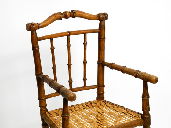 Image 1 of French highchair for a child from the 1930s made of bentwood with Viennese wicker seat