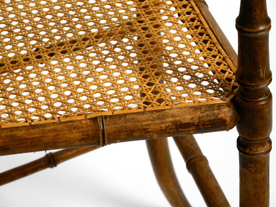 Image 1 of French highchair for a child from the 1930s made of bentwood with Viennese wicker seat