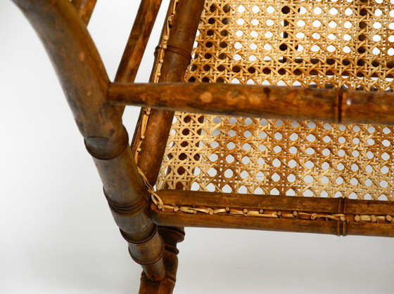 Image 1 of French highchair for a child from the 1930s made of bentwood with Viennese wicker seat