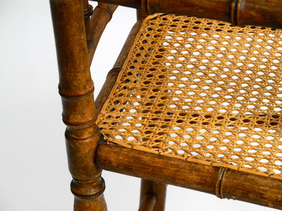 Image 1 of French highchair for a child from the 1930s made of bentwood with Viennese wicker seat