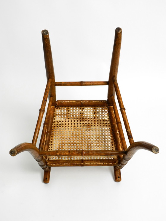 Image 1 of French highchair for a child from the 1930s made of bentwood with Viennese wicker seat