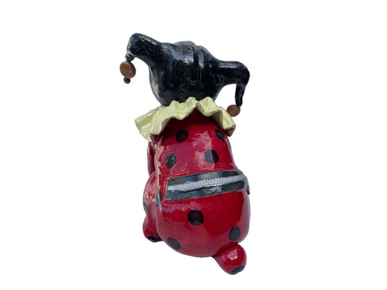 Image 1 of Ceramic art dog in clown costume