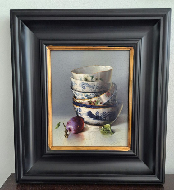 Image 1 of Still Life With Stacked Dishes And Plum By Rib Ritchie