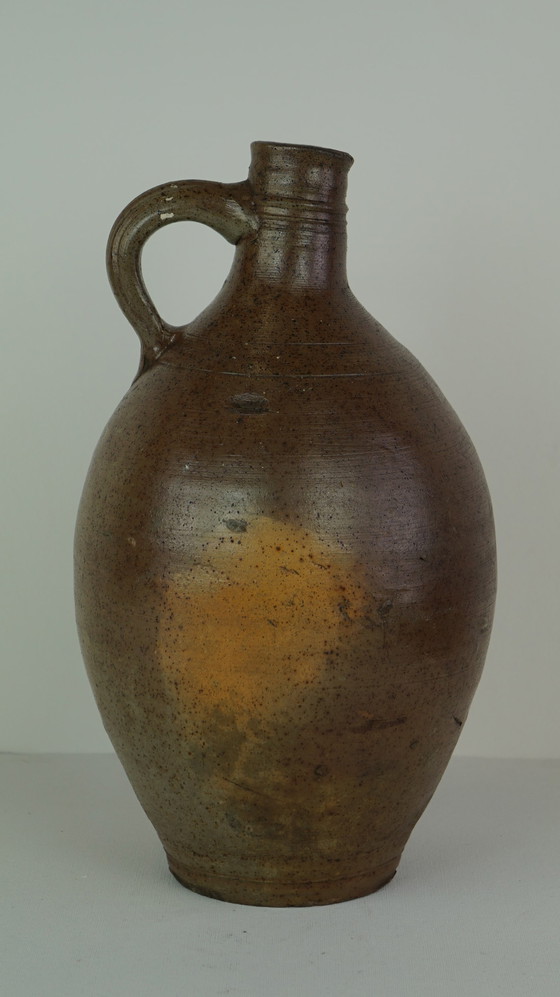 Image 1 of Brown earthenware pitcher with 1 ear