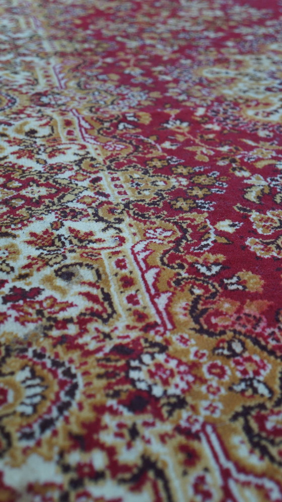 Image 1 of Tapis de style oriental aux couleurs jaune, or et rouge