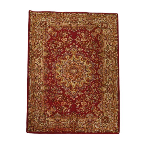 Tapis de style oriental aux couleurs jaune, or et rouge