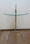Tjord Bjorklund side table glass / chrome