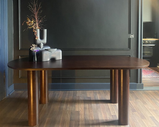 Curved Brown Wooden Table For 6 Chairs