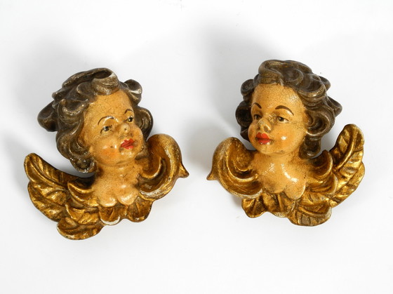 Image 1 of 2 petites têtes d'ange en bois italien des années 1930 à suspendre