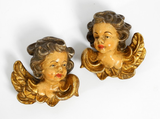 Image 1 of 2 petites têtes d'ange en bois italien des années 1930 à suspendre