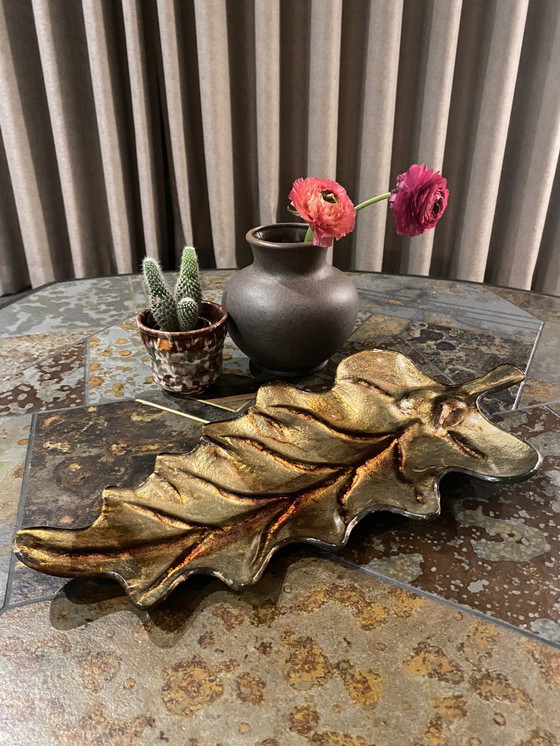 Image 1 of Glass gold-brown bowl in leaf shape