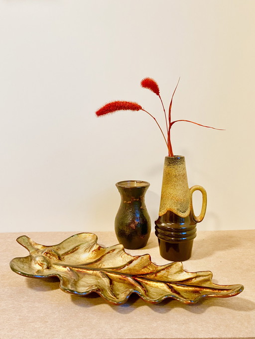 Glass gold-brown bowl in leaf shape