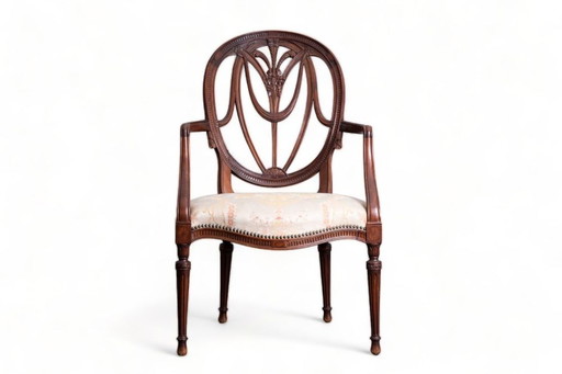 John Linnell A George III carved mahogany 'Prince of Wales feathers' armchair