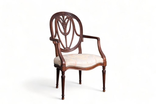 John Linnell A George III carved mahogany 'Prince of Wales feathers' armchair