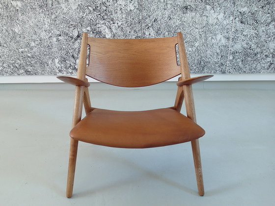 Image 1 of Chaise CH-28 de Hans Wegner, Danemark, 1951