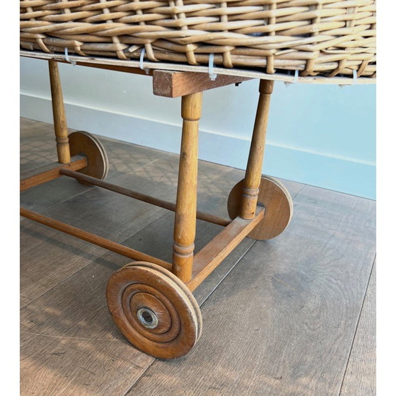 Image 1 of Vintage rattan cradle on wheels, France 1950