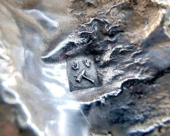 Image 1 of Silver table piece of a Frisian Fireplace