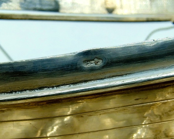 Image 1 of Silver table piece of a Frisian Fireplace