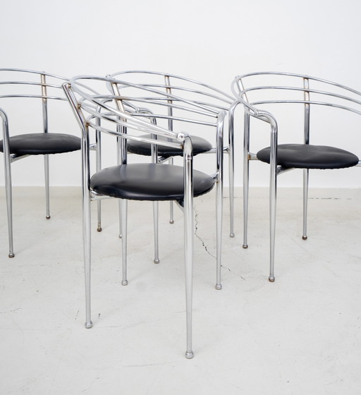 4 chaises post modernes à structure en acier tubulaire