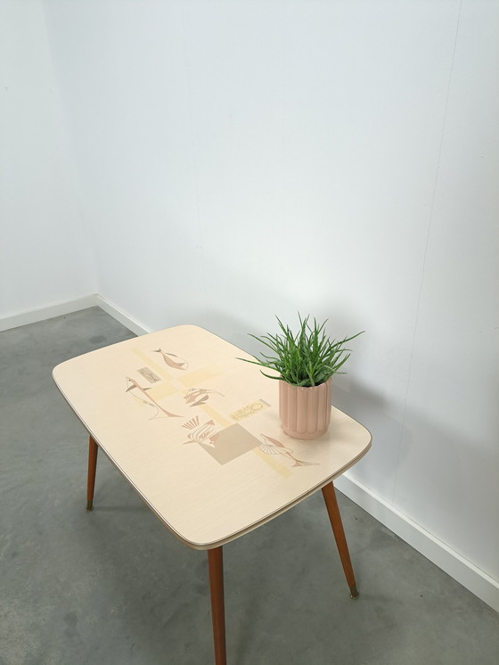 Image 1 of Formica coffee table with brass legs and fish