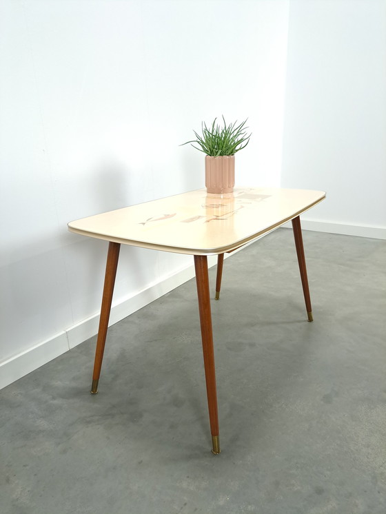 Image 1 of Formica coffee table with brass legs and fish