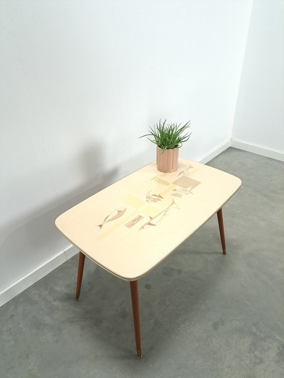 Image 1 of Formica coffee table with brass legs and fish