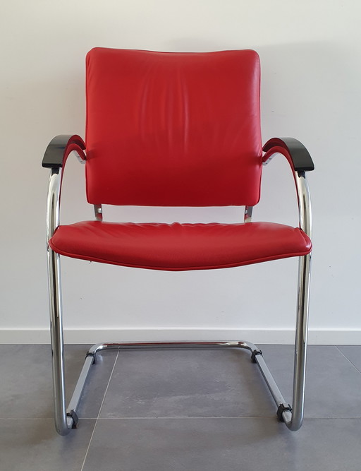 Thonet tubular frame chair red leather