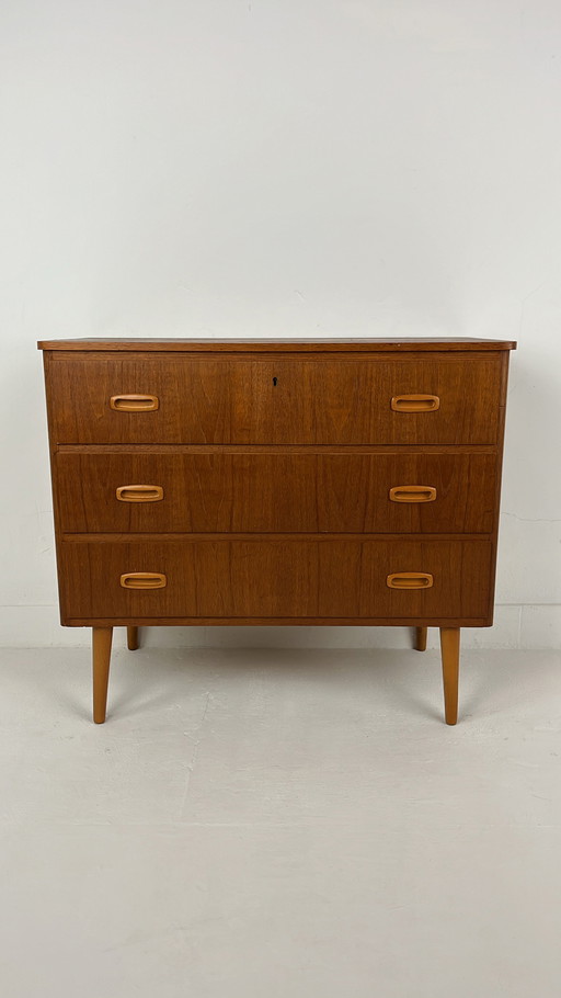 Teak veneer chest of drawers from Sweden