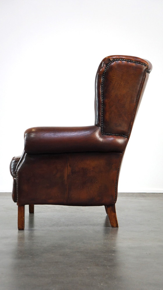 Image 1 of Fauteuil d'oreille en peau de mouton avec coussin d'assise fixe